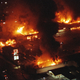 Several buildings fully engulfed in flames as rioting erupted in South-Central Los Angeles after the acquittal of four police officers in the videotaped beating of Rodney King.